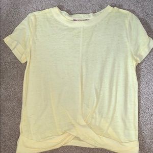 Yellow shirt with knot in front